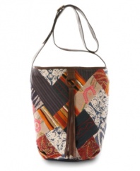 Put a laid-back, urban spin on any outfit by adding this too-cool patchwork bag by Lucky Brand. Ethnic prints and soft leather detailing deliver the effortless boho look you crave.