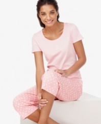 Dream of vacation. These soft, cotton pajamas by Nautica feature cute, printed capri pants and a snuggly t-shirt.