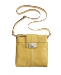 Get organized and look fab with this stunning design by Tignanello. This stylish crossbody features an ultra functional interior for easy access to cards and cash. A polished turnlock closure and signature silvertone hardware add a perfectly posh appeal.