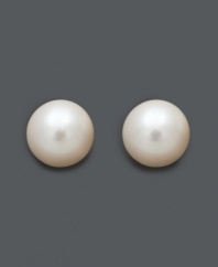 Frame your face with polished pearls. Simple studs feature single AA+ cultured freshwater pearls (12-13 mm) in a 14k gold post setting.