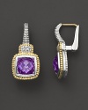 Cushion-cut amethysts sparkle in baroque sterling silver and yellow gold settings. By Judith Ripka.
