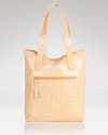 Label-loyalty takes a sleek turn with this ultra-shiny patent tote that works a logo-embossed look from See By Chloé.