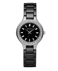 Glamor time: Crystals and black ceramic dress up this watch by DKNY. Round polished stainless steel case and black ceramic bracelet. Crystals at bezel. Black dial features logo and silvertone stick indices and hands. Quartz movement. Water resistant to 50 meters. Two-year limited warranty.