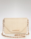 Rachel Zoe's lizard-embossed shoulder bag is a major take on the mini trend. With a removable strap, this bag does double-duty tucked under your arm an ultra-glam clutch.