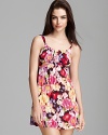 Vibrant watercolor-like floral print decorates a short flowing nightie from OnGossamer.