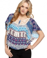 Patchwork print lends bohemian cool to this cute top from Ali & Kris! Pair it with your favorite jeans for a day outfit that's '70's inspired!