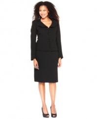 Le Suit's petite black skirt suit is jazzed up with beaded trim at the collar and beaded double button closures at the front of the jacket. Finish the look with your own brilliant baubles.
