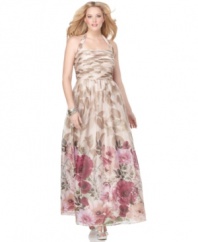 Enchanted garden: A neutral leaf print becomes a colorful poppy print at the hem of this charming plus size evening gown by Adrianna Papell. The halter neckline and pleated bodice lend the silhouette sophistication.