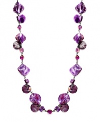 A pop of purple color leaves a lasting effect on your look. Style&co.'s long strand necklace features natural shells in a variety of purple hues. Set in mixed metal. Approximate length: 42 inches.