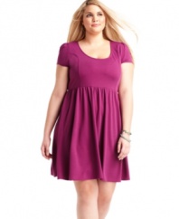 An A-line shape lends a flirty feel to Soprano's cap sleeve plus size dress--look dazzling from day to date night!