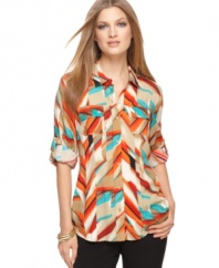 Bold colors and chic style make this petite top by Calvin Klein easy to pair with pieces already in your closet.