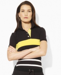 A bold striped pattern and snapped placket add a stylish sensibility to Lauren by Ralph Lauren's petite Emily stretch jersey polo shirt.