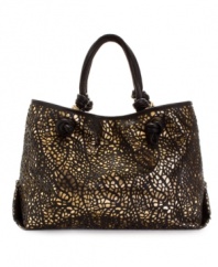 Let Ivanka Trump's Garnet shopper purse be the jewel of your collection this season, with gorgeous lacy cutouts.