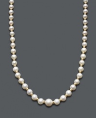 Give the gift of timeless tradition. This polished necklace features graduated, cultured freshwater pearls (4-1/2-7 mm) with a 14k gold clasp. Approximate length: 18 inches.