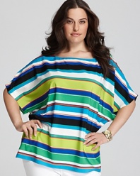 This VINCE CAMUTO tee is designed with slouched dolman sleeves in a modern mix of stripes that pair perfectly with anything from sleek denim to a crisp white skirt.