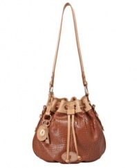 The Maddox drawstring by Fossil features a rich embossed leather with eye-catching vintage-inspired details. A classic bucket shape and polished rose goldtone hardware make this a go-to bag.