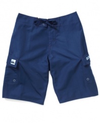 Style stays simple with these Quiksilver board shorts so the only things that stand out are his swimming skills.