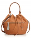 MICHAEL Michael Kors crafts a super-trendy drawstring purse from buttery-soft matte leather and ramps up the shine with rhodium hardware for an elegantly eye-catching look.