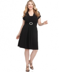 A beautiful embellished waist lends low-key glam to this draped matte jersey plus size dress from R&M Richards.
