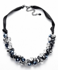 The perfect accent piece for your favorite little black dress. This elegant Ali Khan necklace features chic clusters of jet black and hematite-colored glass beads strung on a delicate black ribbon. Clasp crafted in mixed metal. Approximate length: 18 inches + 3-1/2 inch extender. Approximate drop: 3 inches.