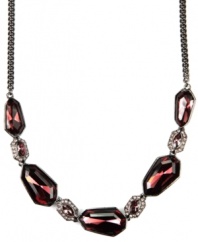 Sumptuously stylish. Givenchy's glamorous statement necklace will add an exquisite finishing touch to your evening ensemble. Adorned with glass accents in a rich vintage rose hue, it's made in hematite tone mixed metal. Approximate length: 16 inches + 2-inch extender.
