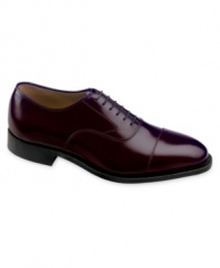 A truly classic, elegant pair of oxford men's dress shoes crafted in soft Italian calf leather with leather lining, with a smooth cap toe and classic welt construction. Imported.