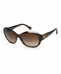 This elegantly crafted collection from a premier luxury eyewear house combines multiple classic logo elements with the glamour of gradient lenses and a crystal-encrusted Coach flower detail at the temple. Coach lenses provide state-of-the-art sun protection, blocking 100% of the sun's harmful ultraviolet rays.