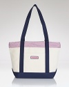 Vineyard Vines' totes have cult status among the prep set, so be the first to carry the brand's whale-print style. In sturdy canvas, this bag carts everything from books to beach towels.