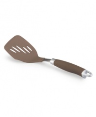 Totally turn things around in the kitchen! Food prep gets a precision edge with a sleek slotted bronze-hued turner that combines a silicone SureGrip handle and durable stainless steel for comfort and strength that bring even more meals to the table.