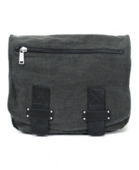 The day is yours. Throw this stylish messenger bag from Kenneth Cole Reaction over your shoulder and hit the road with everything you need. Made of durable cotton canvas with a cool-as-could-be graphic print interior, it's sure to be the bag you grab time and time again. Limited lifetime warranty.