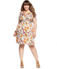 Spring into the season with American Rag's short sleeve plus size dress, flaunting a floral print.