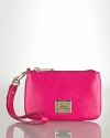 Carry your essentials in style with this textured leather wristlet from Lauren by Ralph Lauren.