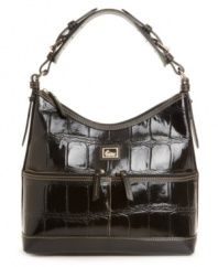 Two handy front pockets add zip to the glossy croc-embossed patent leather sac purse by Dooney & Bourke.
