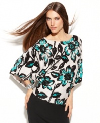 Sequins make this bold pattern sparkle – INC's dramatic, draped petite sweater starts any outfit off on the right foot!
