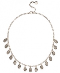 Look marvelous in marcasite! Set in silver tone mixed metal, this gorgeous Monet collar necklace is embellished with glittering resin and cubic zirconia accents. Approximate length: 16 inches + 2-inch extender.