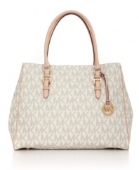 Available only at Macy's, this signature tote from MICHAEL Michael Kors features smooth Vachetta leather trim and 18K gold logo charm.