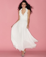 A high, ruffled collar ups the chic factor on this floor-sweeping halter neck gown from B Darlin!