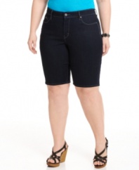 A dark wash lends a slimming finish to Levi's plus size Bermuda shorts, featuring by a tummy control panel for a flattering fit.