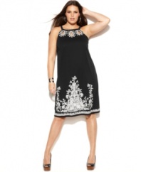 Flash a hint of skin with INC's halter plus size dress, accented by alluring keyholes.