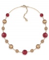 Scarlet fever. Rich red and gorgeous gold glass accents distinctively decorate Carolee's lightweight illusion necklace, making it a fashionable choice for fall. Crafted in gold tone mixed metal. Approximate length: 16 inches + 2-inch extender.