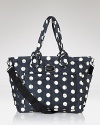 For the haute stroller mom, MARC BY MARC JACOBS' nylon baby bag is an ultra-cute essential. With plenty of pockets and a poppy print, this playful tote keeps your little one's essentials stowed in designer fashion.