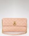 In a sweet baby-pink hue, Marc Jacobs' quilted leather fold-over clutch is too cute to handle. For party-girl perfection, carry yours with a flowy jersey dress and high-shine heels.