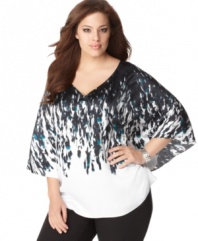 A bold print and batwing sleeves add dramatic flair to Tahari Woman's plus size top-- dress it up with trousers or down with denim.