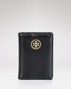 Tory Burch's logo-embossed leather transit holder makes it posh to go public. Slip it inside your purse to ease the daily commute.