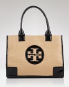 Give your on-vacation style a designer upgrade with this straw tote from Tory Burch. Here, patent trims lend this roomy beach bag glossy good looks.