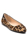 Elegant cap toe ballet flats go big-cat cool with soft, leopard-printed haircalf. By Calvin Klein.