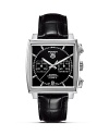 TAG Heuer's iconic Monaco series remains a legend more than 40 years after Steve McQueen debuted it in the film Le Mans. The first water-resistant square chronograph, it was revolutionary both in technical achievement and design, and remains so to this day. Features a black dial on black alligator strap.