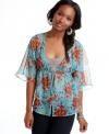 Integrate a pretty print into your stock of layers with this gauzy, kimono-inspired bed jacket from Eyeshadow!
