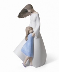 Representing the love that is boundless and lifelong, this exquisite figurine depicts a young girl embracing her mother. In delicate painted hues, a high gloss finish, and porcelain so finely crafted you can just about feel the wind in your own hair. Measures 12.5x7.25.