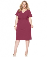 A ruched empire waist lends a flattering line to NY Collection's short sleeve plus size dress-- dress it down for day and up for play!